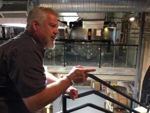 Corey Marshall, founder and CEO of Tivoli, explains the history and current operation of the brewery. Photo by Lee Graves